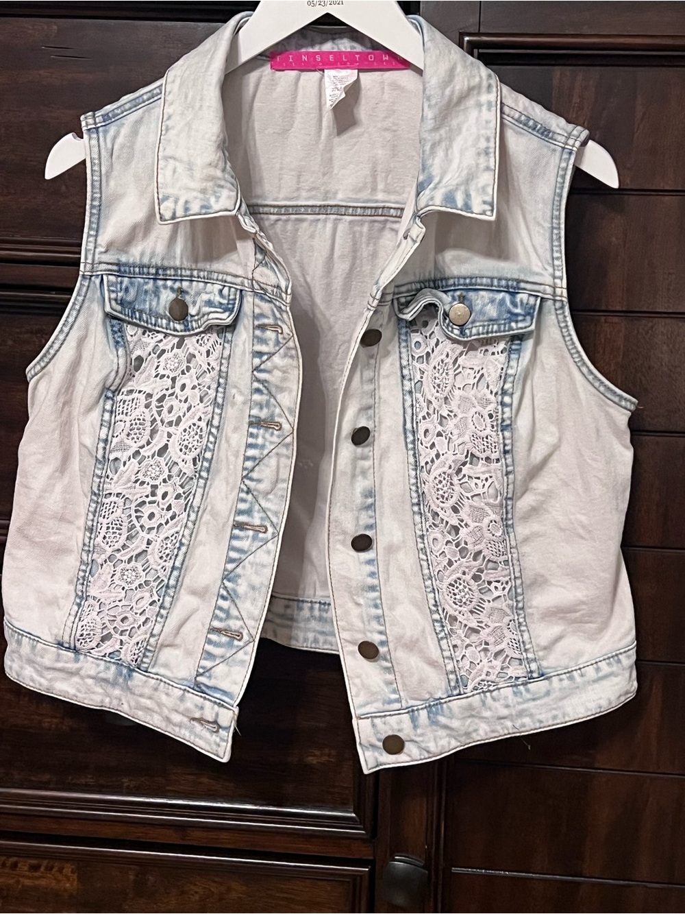 Ladies size large-light-wash denim vest with white floral lace
